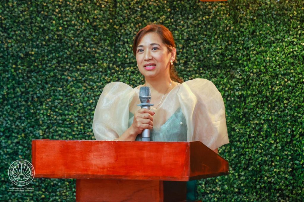 Helen Grace Arceo, a Filipino-American nurse based in Virginia, USA, expresses her heartfelt gratitude to the Department of Tourism, Amaia Land Corp., Cebu Pacific Air, and all the generous sponsors of BBMG for highlighting the vital role of Overseas Filipino Workers (OFWs) as Philippine tourism ambassadors.